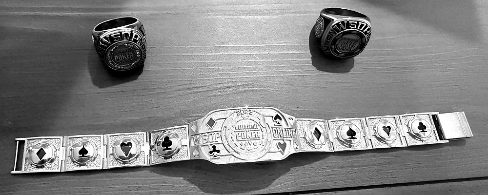 A WSOP bracelet and two Circuit rings